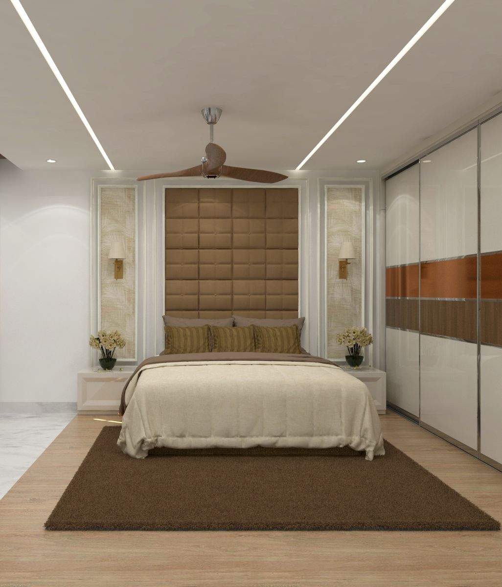 This room embodies a classic theme with wooden paneling, upholstered accents, and wall-mounted lamps, while the use of white adds timeless.